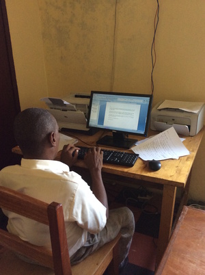 A teacher using computer in Business Department 3